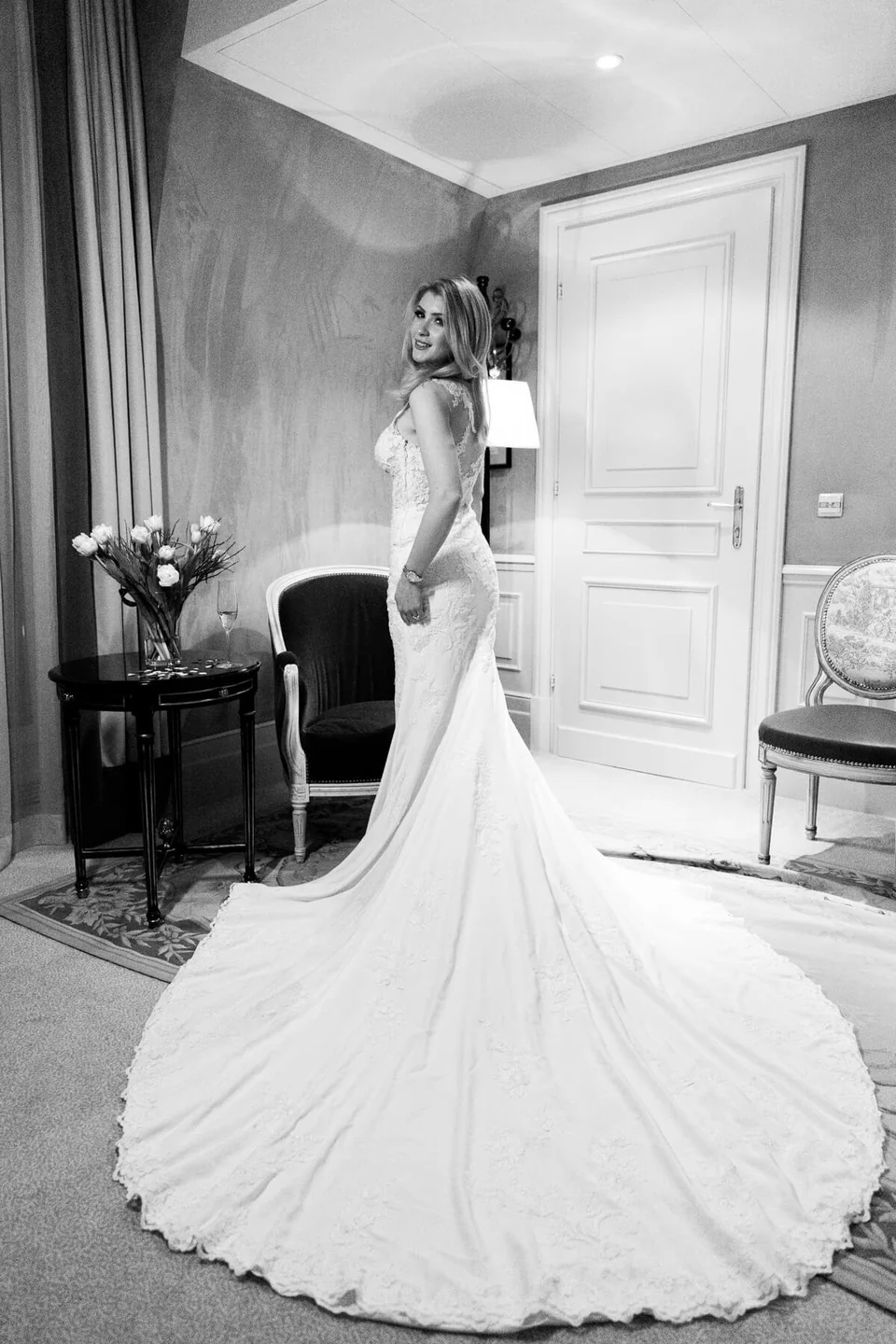 Bride in her long wedding dress in a suite of the Hotel Sacher Vienna